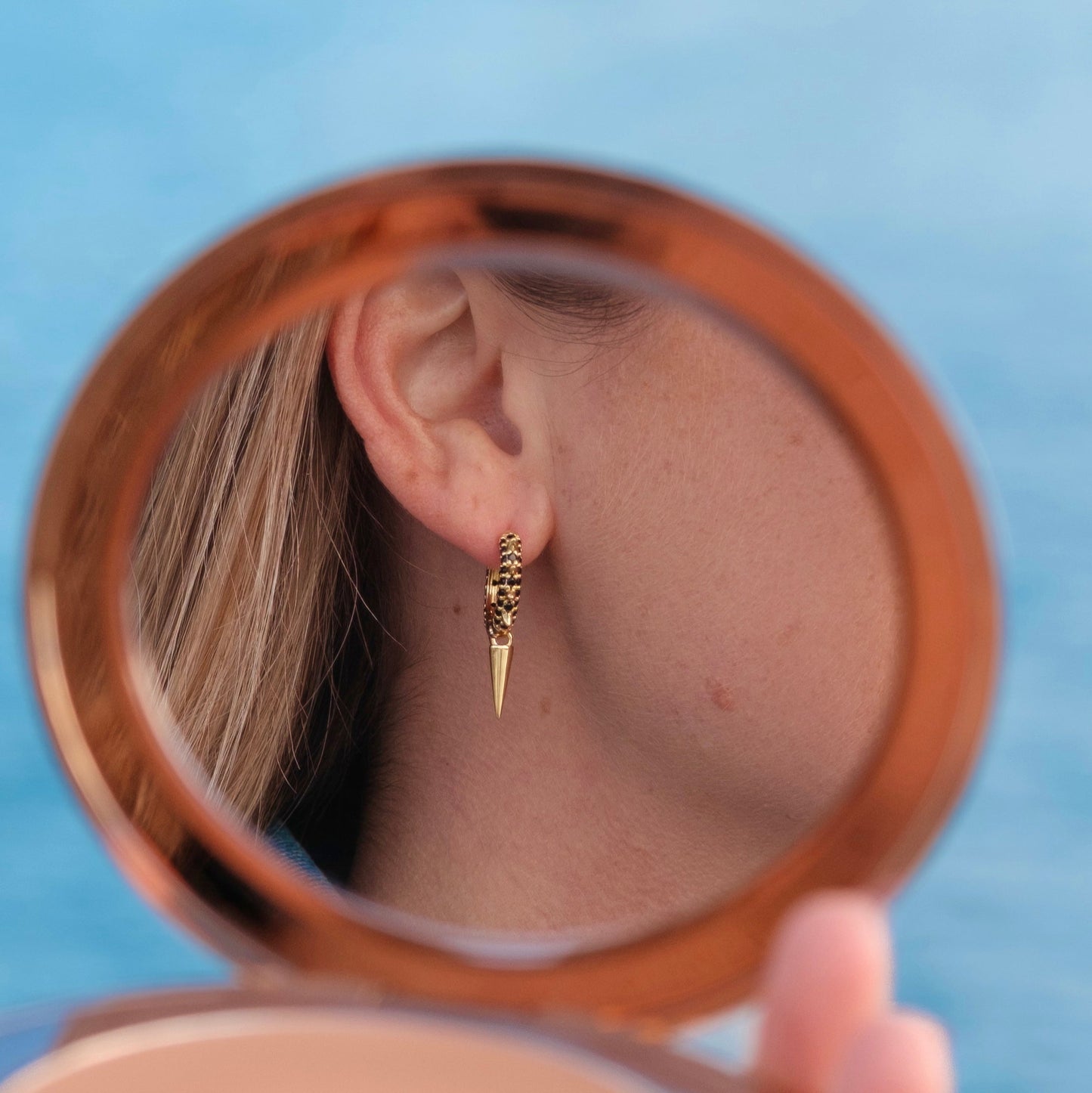 Hoop earring with black cubic zirconia stones