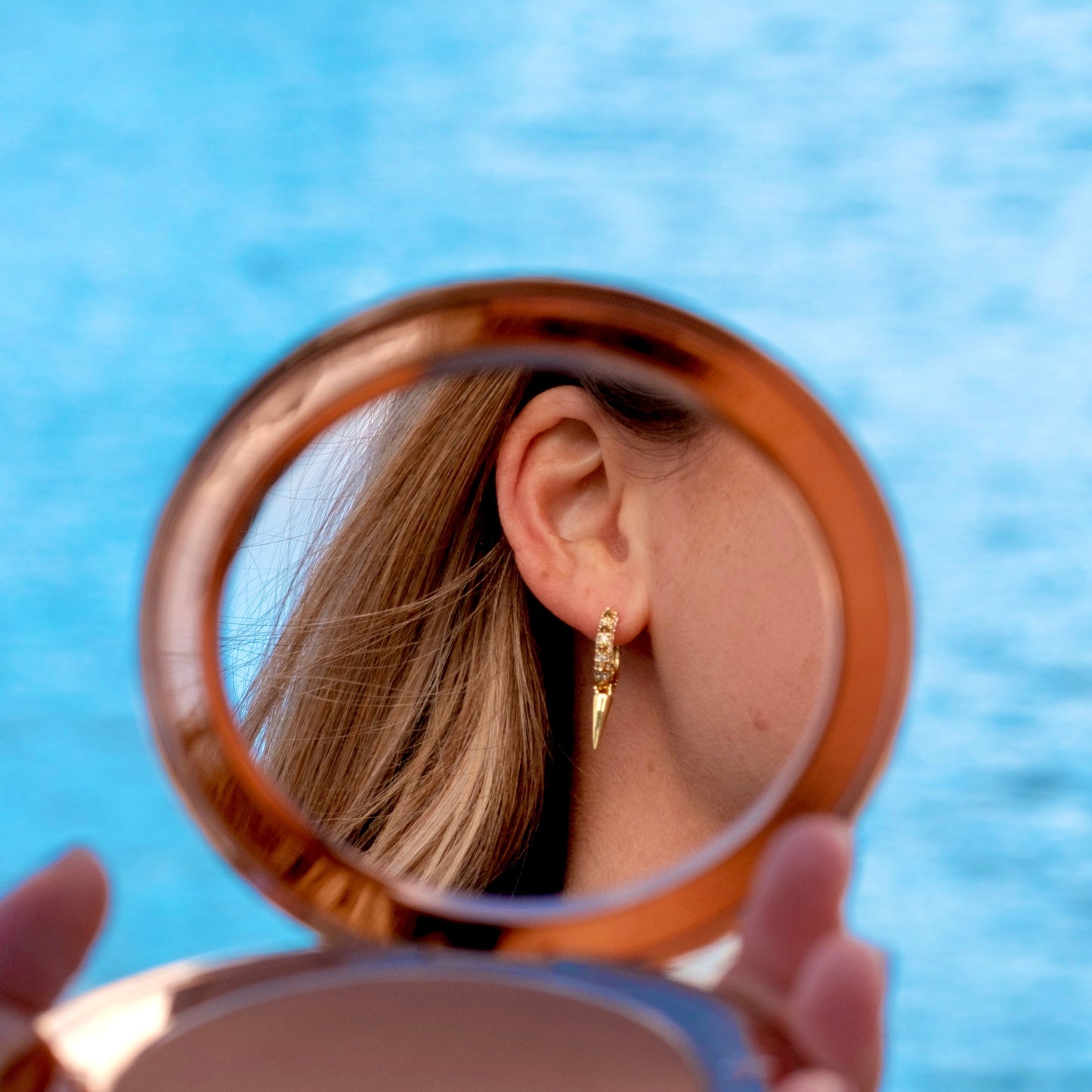 Hoop earring with white cubic zirconia stones