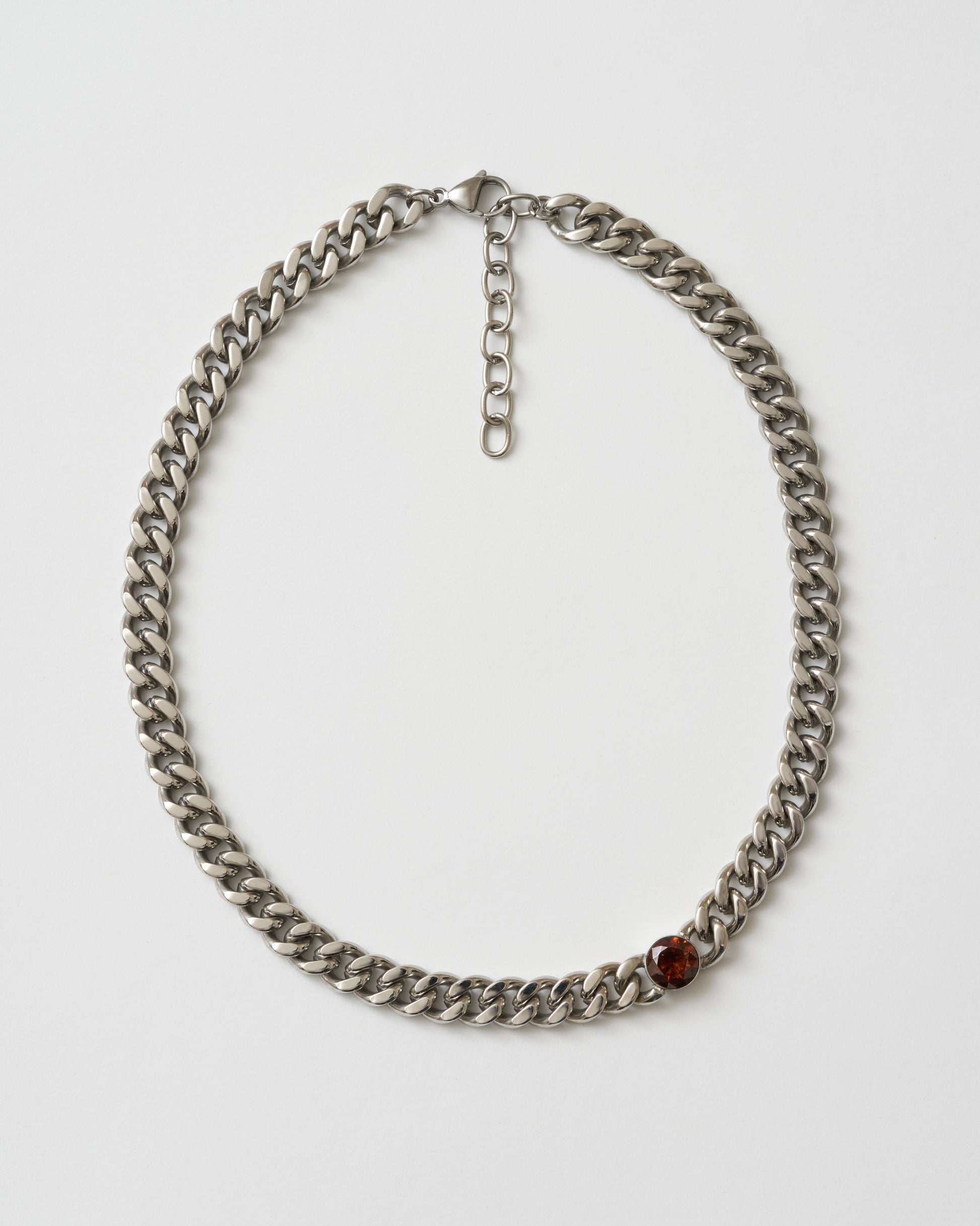 Silverhalsband med asymmetrisk mörkbrun zirkonia-sten